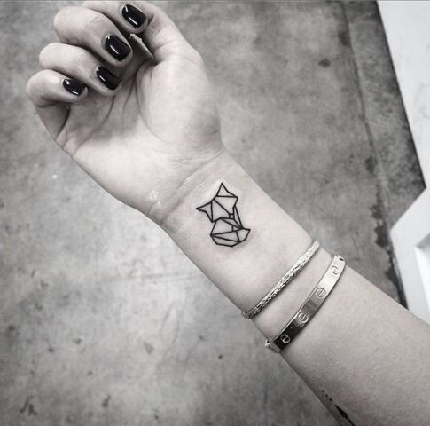 Origami tattoo on the wrist