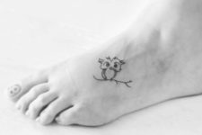 Owl tattoo on the foot