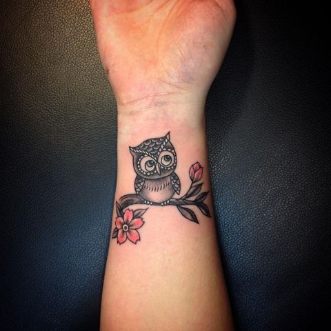 Owl with flowers tattoo