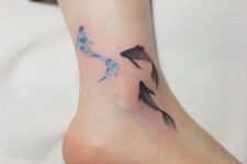 Several fishes tattoo on the ankle