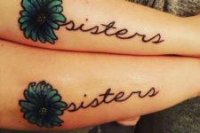 Sister word tattoos with green flowers
