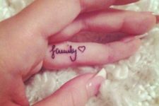 Tiny family word tattoo