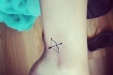 Tiny tattoo on the ankle