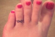 Tiny tattoo on the toe