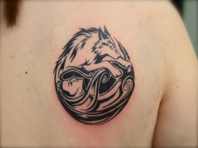 Tribal wolf tattoo idea