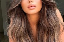 dark brown hair with bronde and caramel balayage and waves is a lovely solution for a dimensional and beahcy look