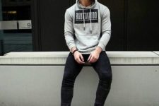 03 black jeans, white sneakers and a grey sweatshirt