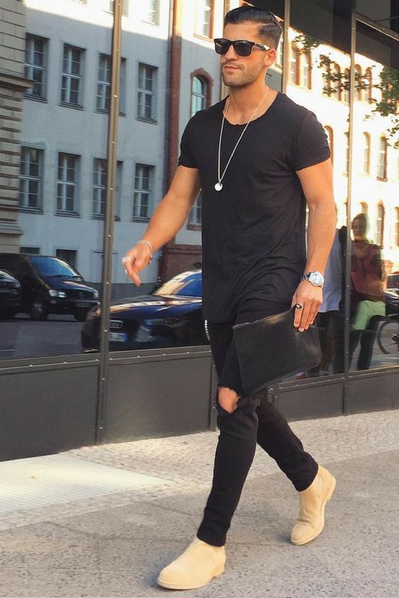 black ripped jeans, a black tee and yellow boots to stand out