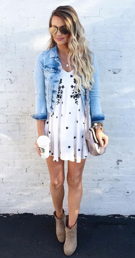 a printed mini dress, a distressed denim jacket and neutral suede boots