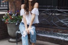 05 ripped blue jeans, a white lace off the shoulder top and white sneakers