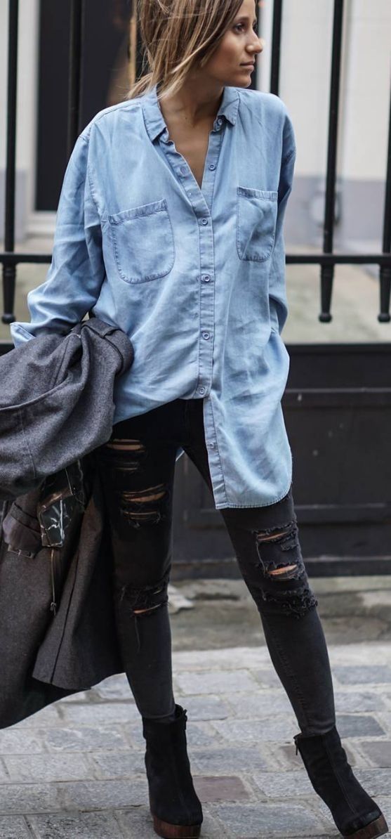 black ripped jeans, a chambray shirt and boots