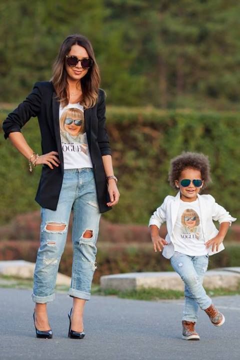 ripped jeans, printed Vogue tees, black shoes and a jacket for the mom, sneakers and a white jacket for the girl