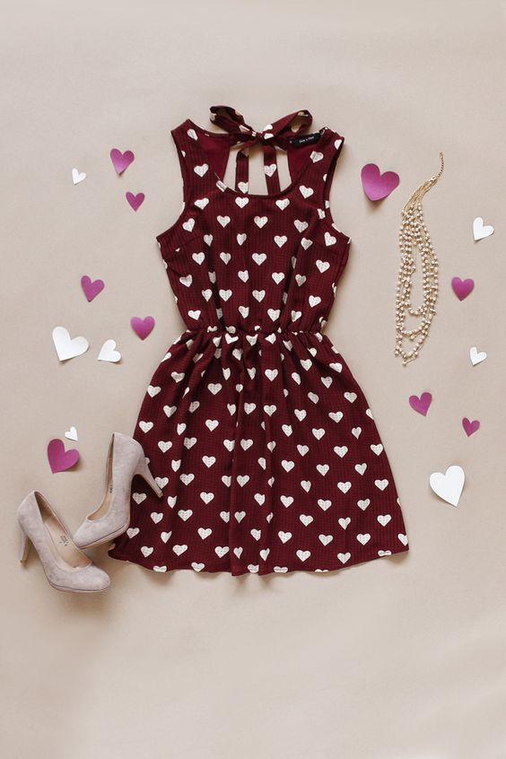 burgundy heart-printed dress with neutral suede shoes