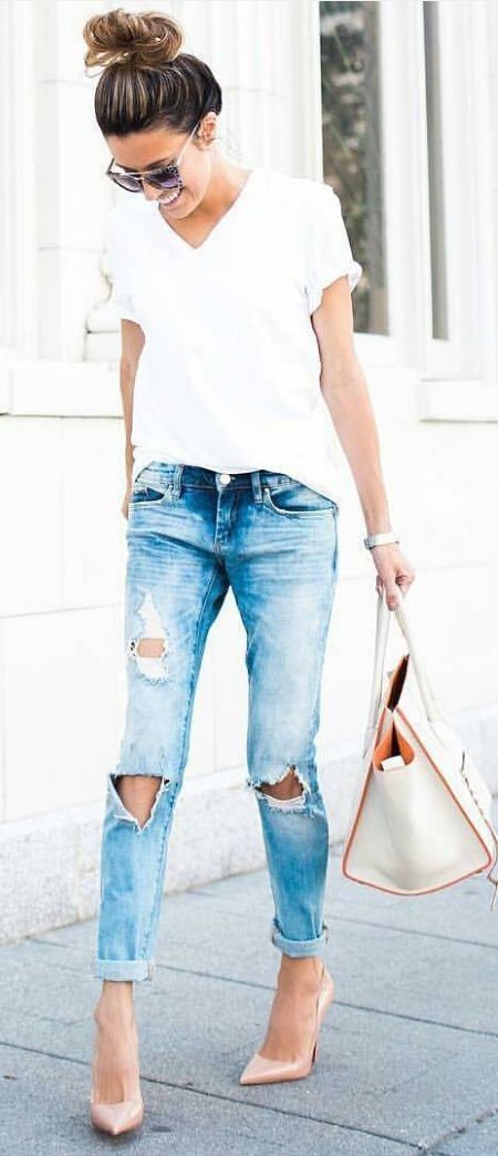 ripped blue jeans, a white tee and blush heels