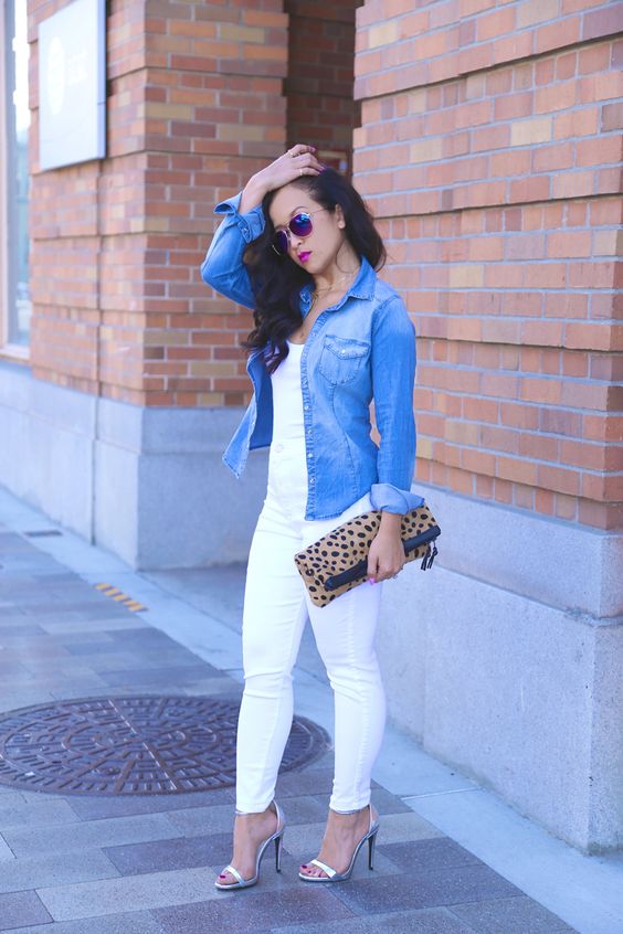 all-white look with a denim jacket and metallic heels