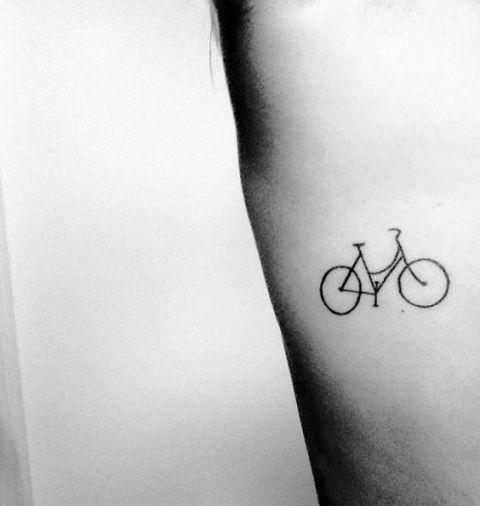 Bicycle tattoo on the side
