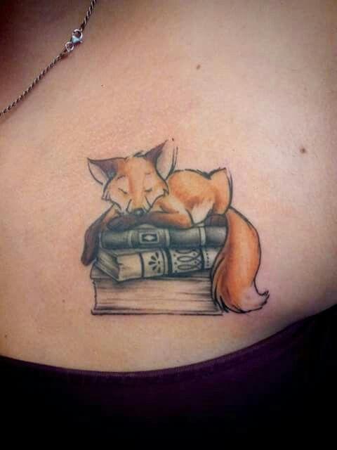 Books and fox tattoo