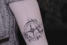 Compass tattoo on the arm