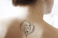 Horse and love sign tattoo on the back