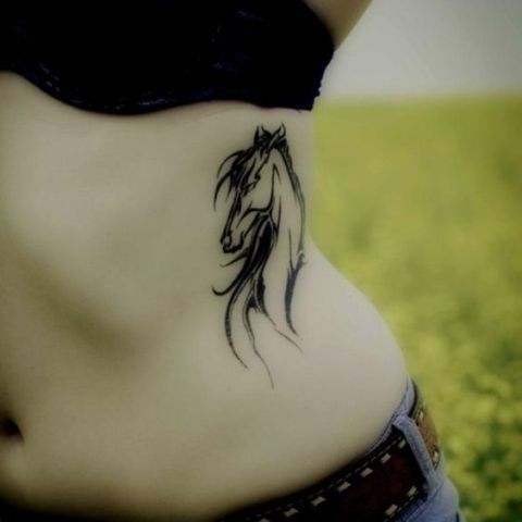 Horse tattoo on the left side