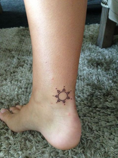 Minimalistic tattoo on the ankle