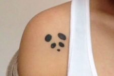 Minimalistic tattoo on the shoulder