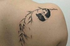 Panda with branch tattoo