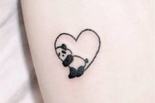 Panda with heart tattoo
