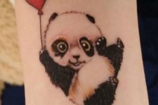Panda with red balloon tattoo