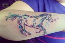Purple and blue horse tattoo on the arm
