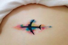 Watercolor airplane tattoo