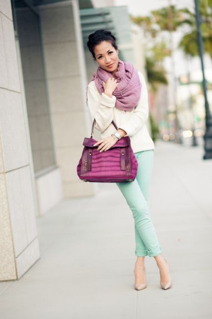 With beige shirt, pink scarf, purple bag and neutral color shoes