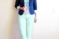 With blue blazer, neutral color shoes and statement necklace