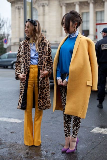 With blue shirt and leopard coat