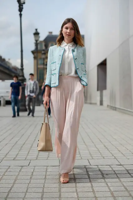 With button down shirt, pastel color jacket, bag and heels