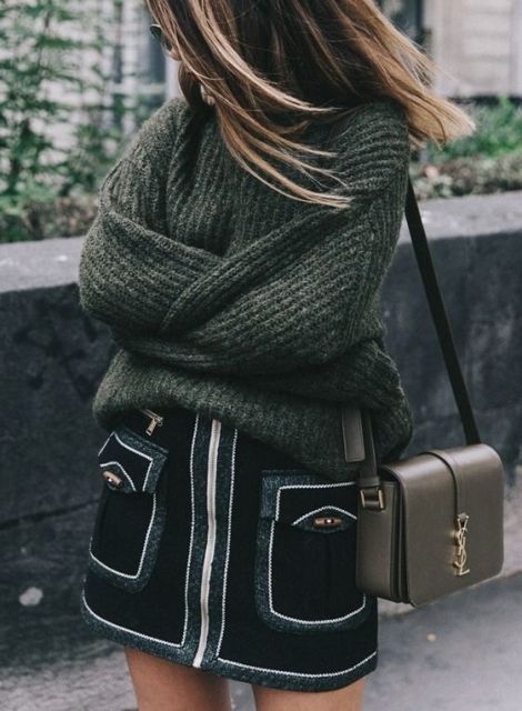 With cozy sweater and mini bag