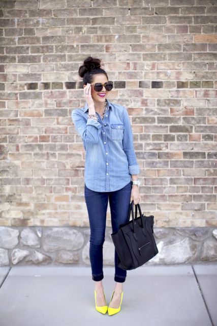 With denim shirt, crop jeans and black bag