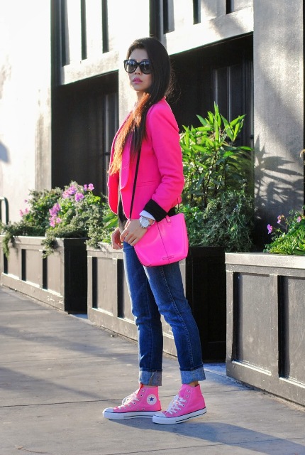With jeans, pink and white converse and pink bag