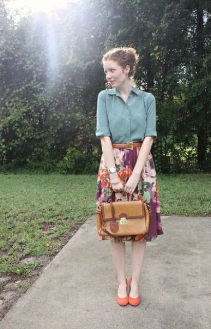 With mint shirt, floral midi skirt and leather bag