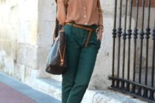 With neutral color shirt, belt, heels and tote