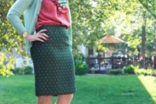 With pink blouse, emerald pencil skirt and heels