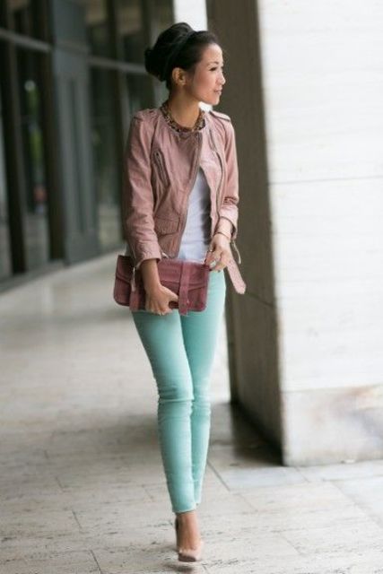 With pink jacket and clutch