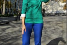 With polka dot shirt, green sweater and gray flats