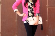 With printed shirt, black leggings, black flats and white clutch