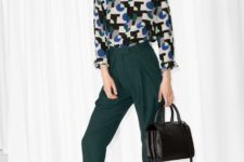 With printed shirt, black shoes and bag