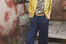 With printed shirt, yellow jacket and belt