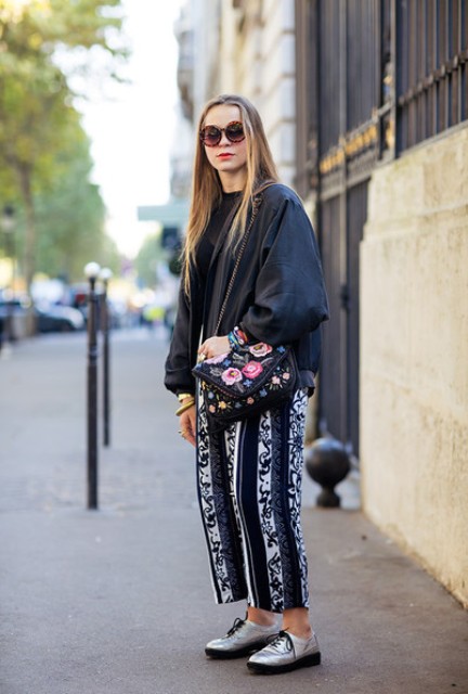 With silver shoes, printed bag and loose jacket