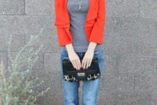 With striped shirt, flare jeans and clutch