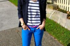 With striped shirt, navy blue jacket, neutral color shoes and sunglasses