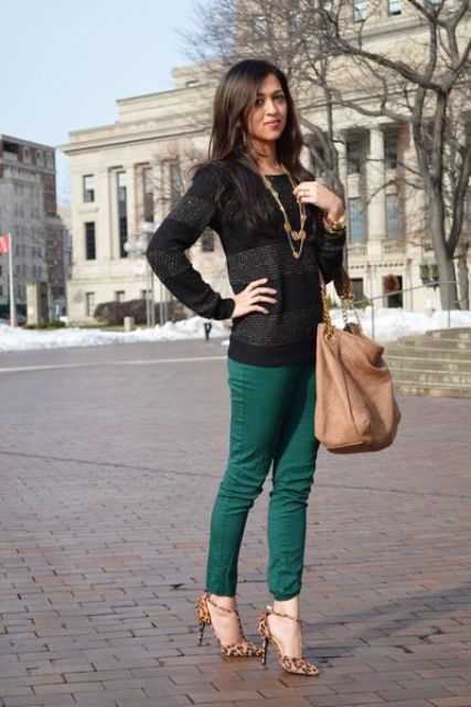 With striped sweater, leopard heels and big bag